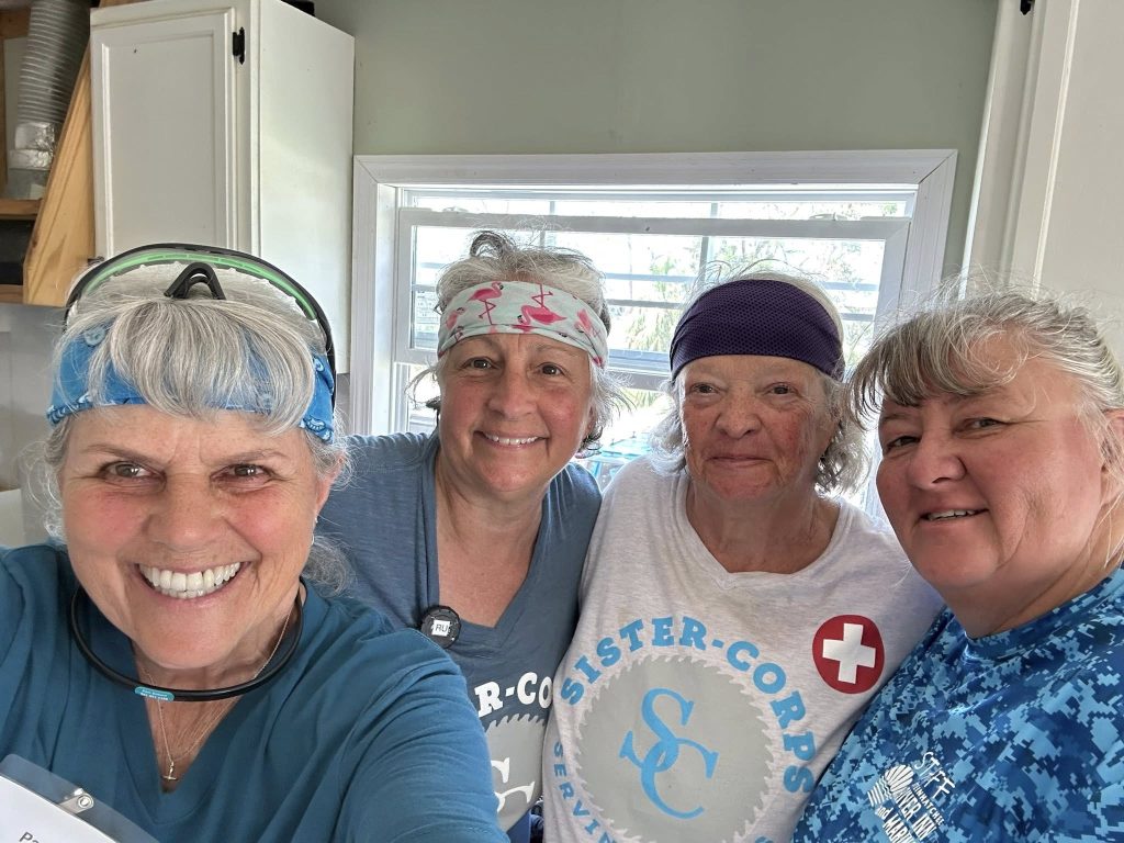 group of 4 great smiles - Sister Corps